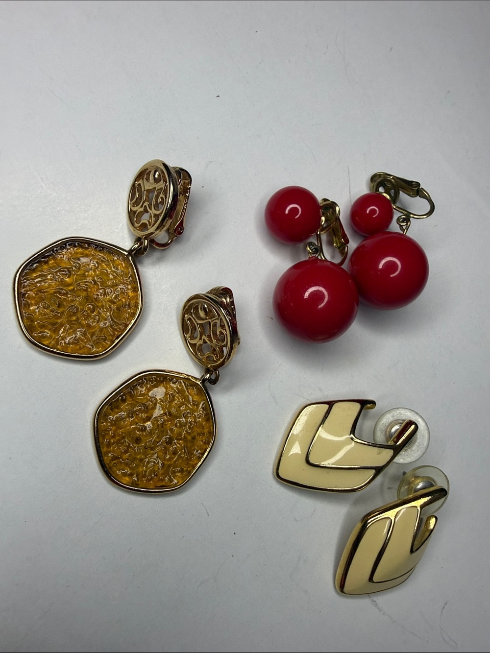Sarah Coventry , Crown Trifari and TRIFARI Gold-Tone Earrings with Amber Centers